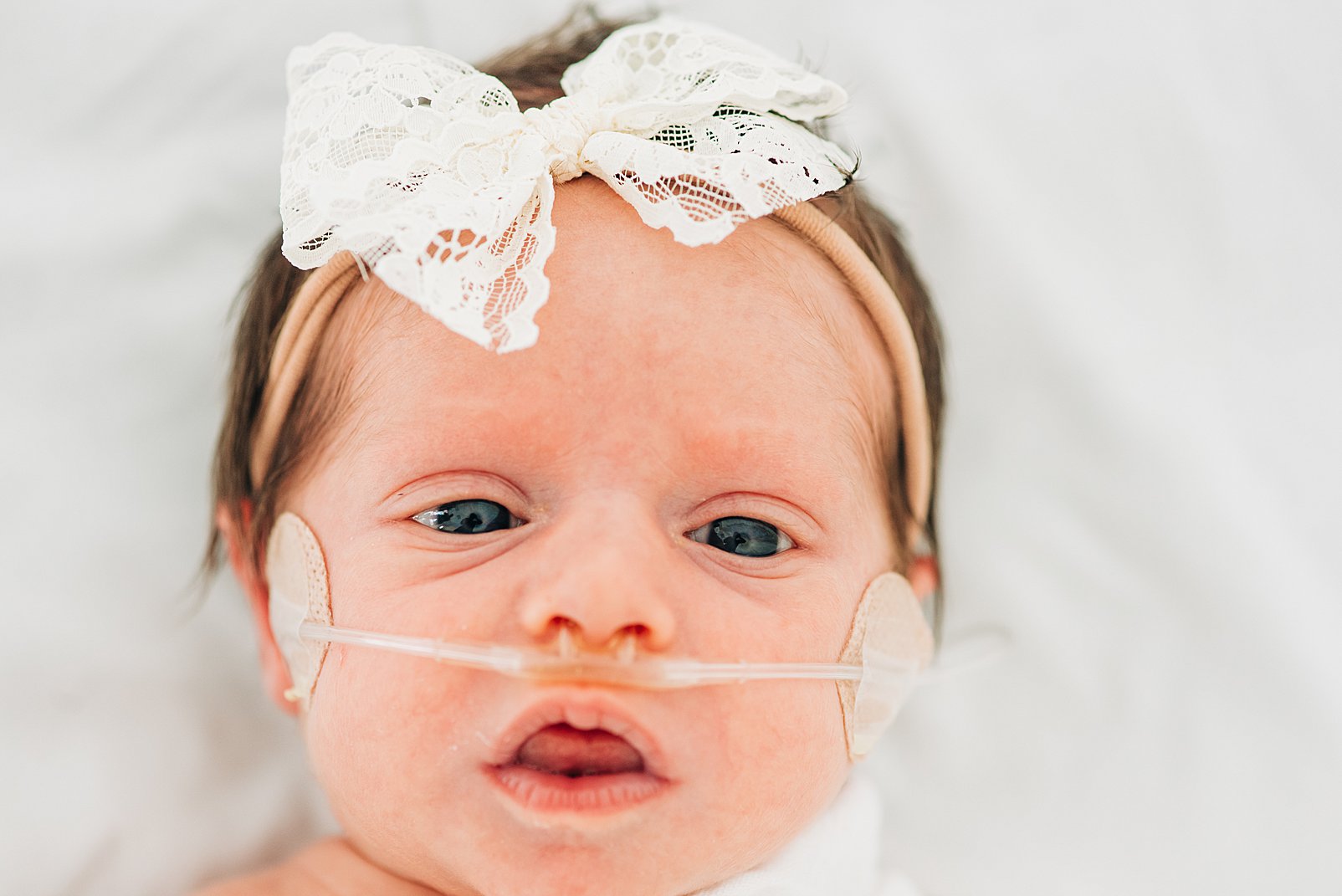 Newborn baby with oxygen